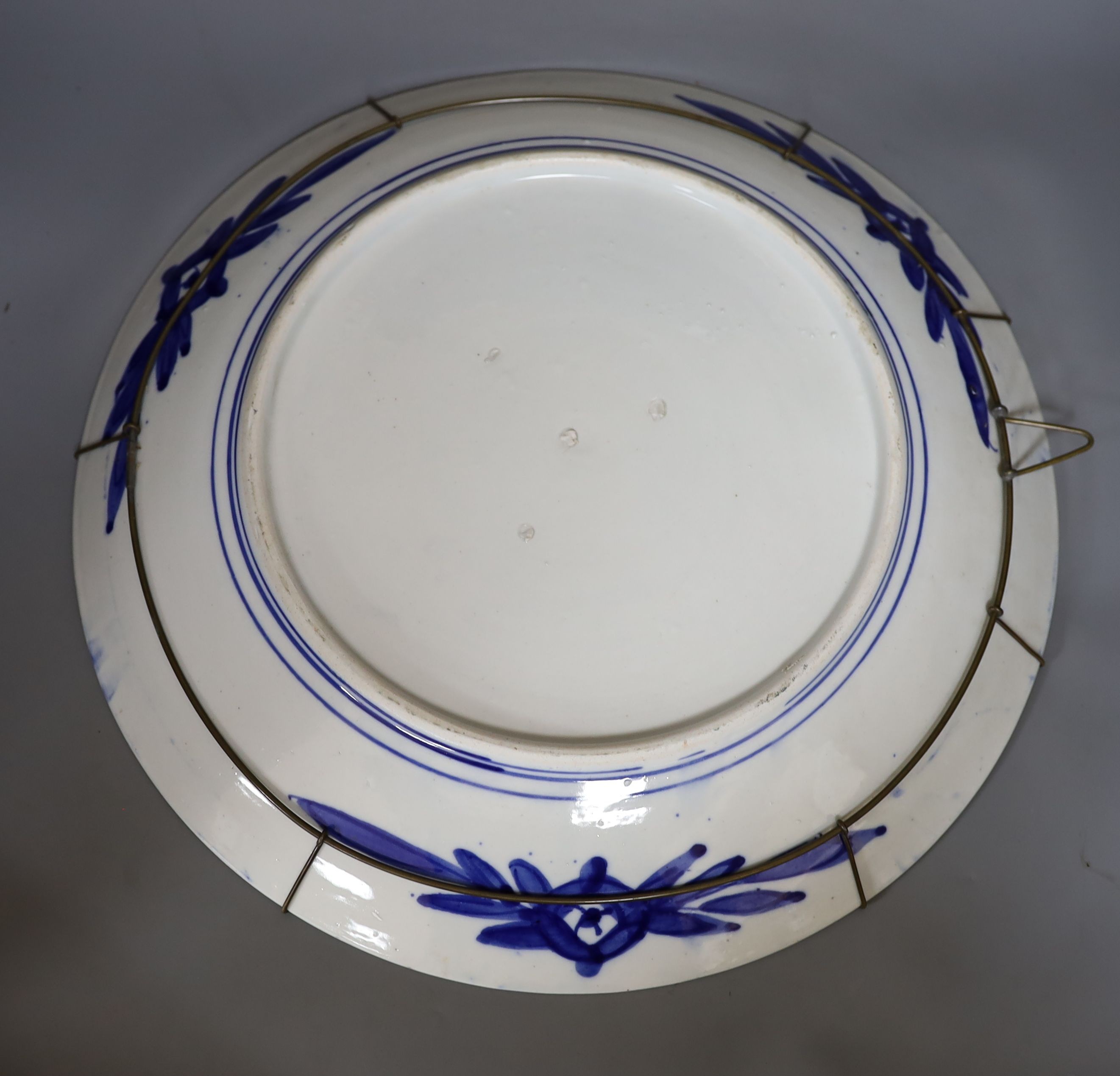 Two Imari dishes, largest 45cm., and an Imari bowl